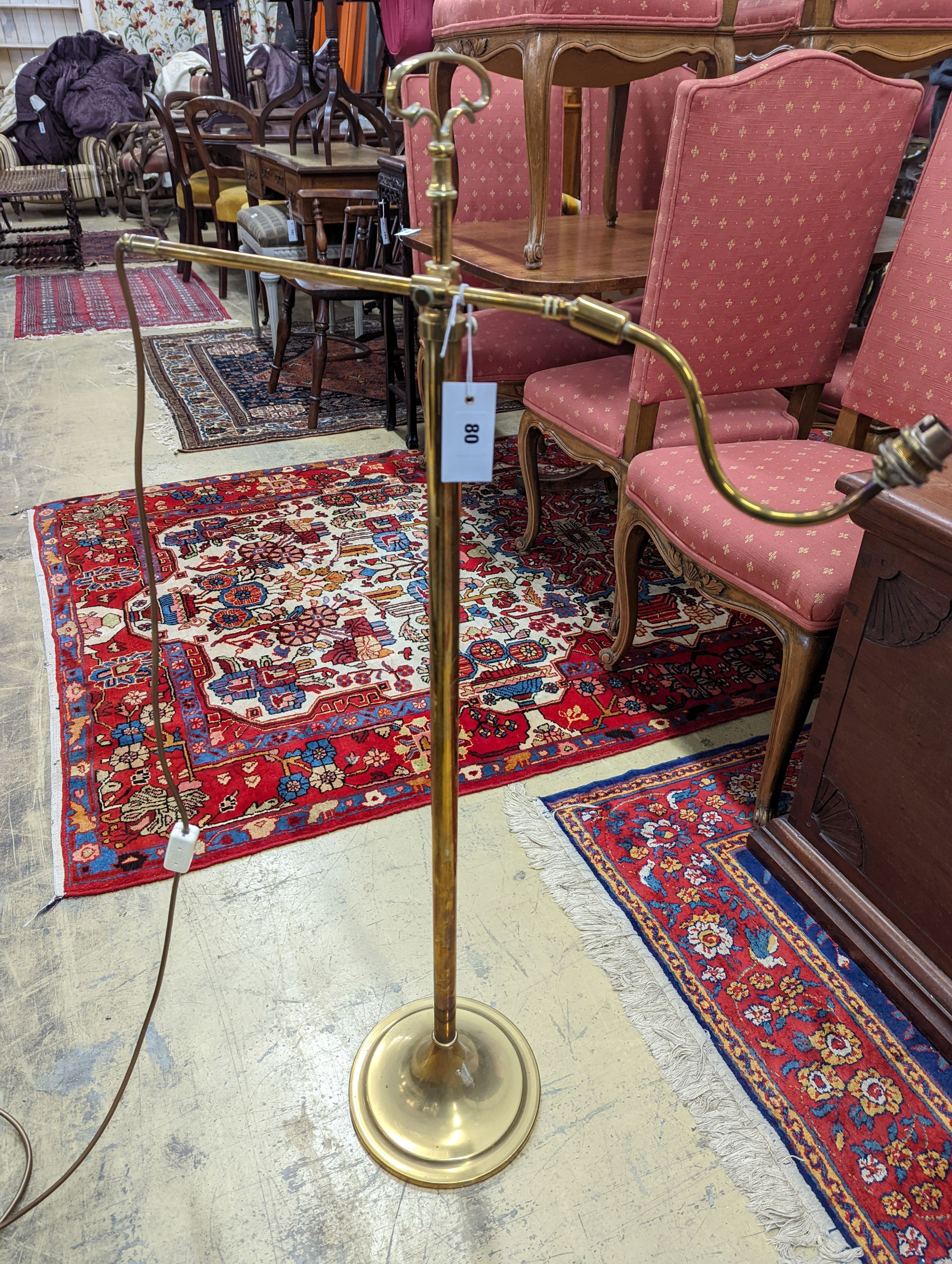 An Edwardian brass telescopic floor lamp converted to electricity